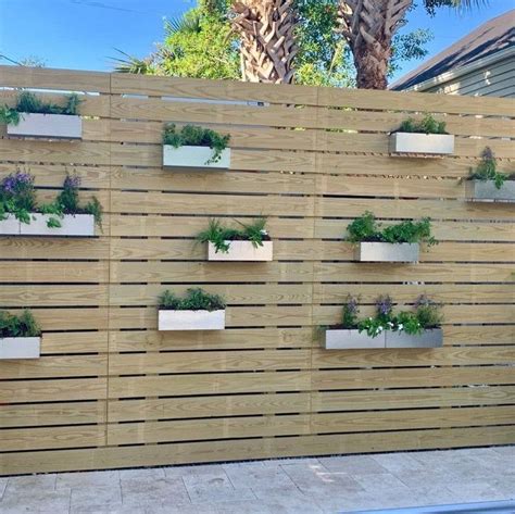 metal fence planter boxes|planters that hang on fences.